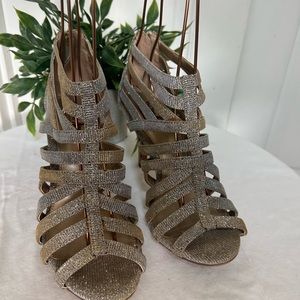 Coach and Four Women’s Heeled Strappy Sandal with Zipper